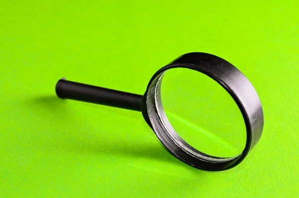 Magnifying Glass Green Background Royalty Free Stock Images