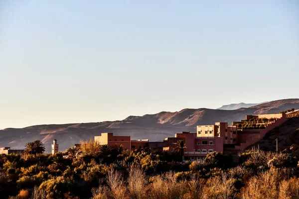 landscape with buildings in mountains