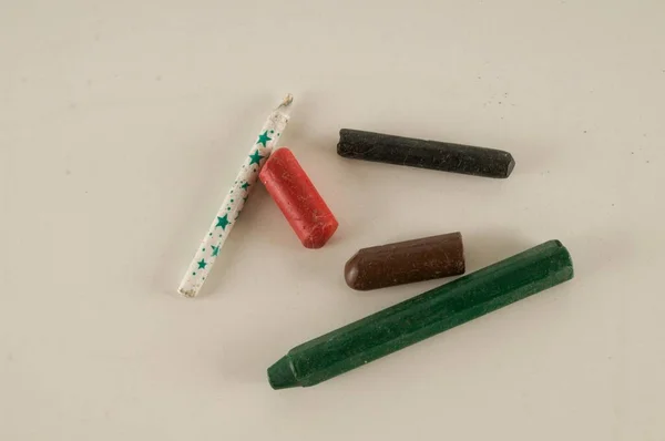 close-up shot of crayons on white background