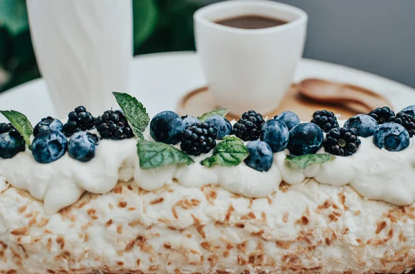 Homemade cake with blueberries and blackberries