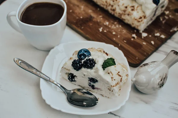  piece of cake with cream and berries