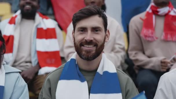 Happy man waving with french flag during soccer game — Stockvideo