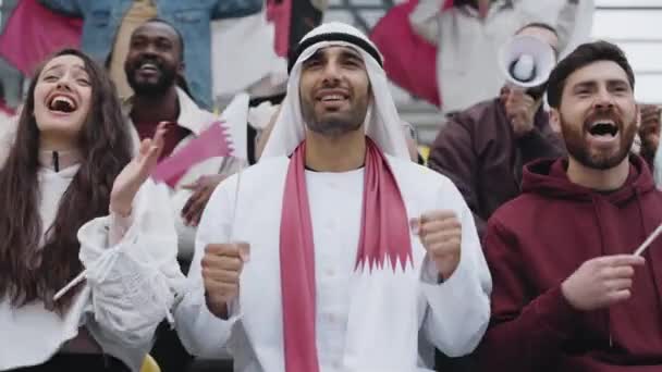 Muslim man gesturing and shouting during soccer game — 비디오