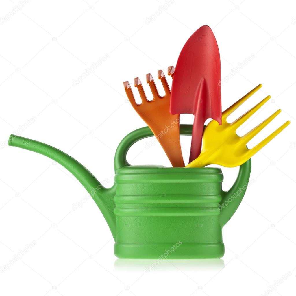 Colorful gardening tools : Watering can, bucket, spade over white ...
