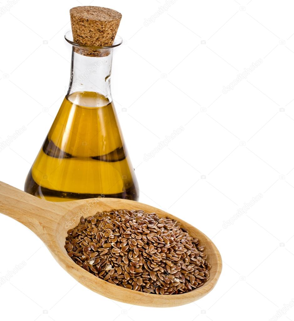Bottle flax seed oil isolated on white background Stock Photo by
