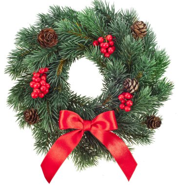 Christmas decoration wreath with red holly berries isolated on white background
