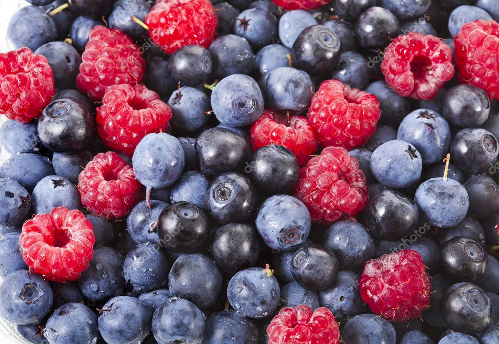 Raspberries and blueberries — Stock Photo © Madllen 42051395