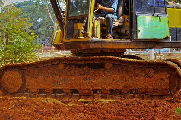 Экскаватор - копать землю — стоковое фото