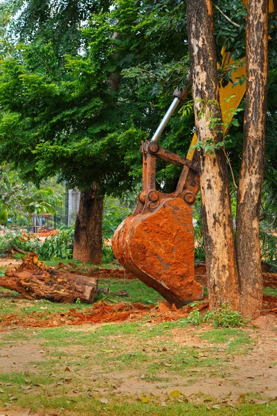 Graafmachine - graven van de grond — Stockfoto