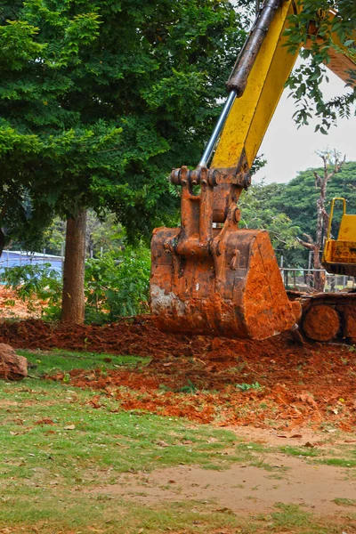 Excavadora - cavar el suelo — Foto de Stock