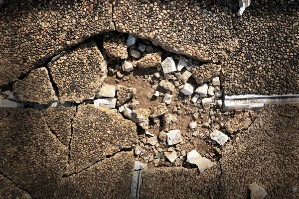 Betonnen vloer achtergrondstructuur beschadigd. — Stockfoto