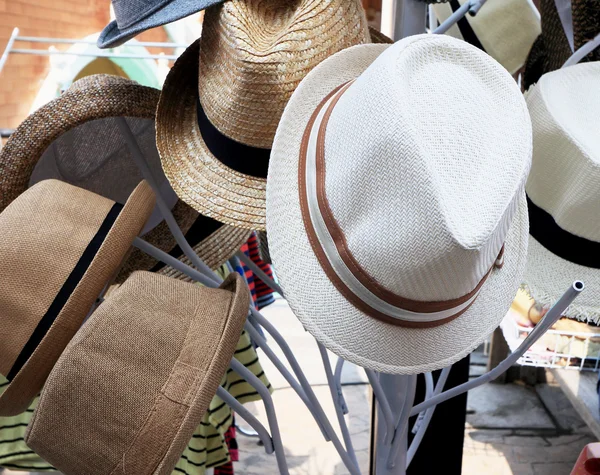 Hats are stacked for sale at the market — Stock Photo, Image