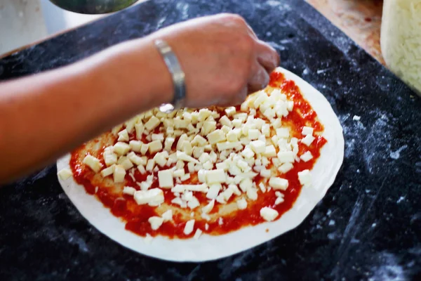 Making Italian pizza with ham and cheese — Stock Photo, Image