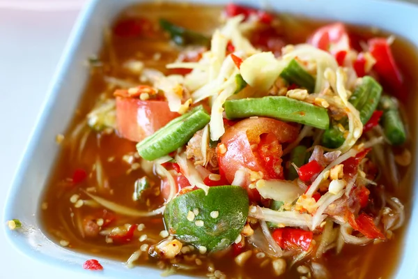 Papaya salad in a dish — Stock Photo, Image