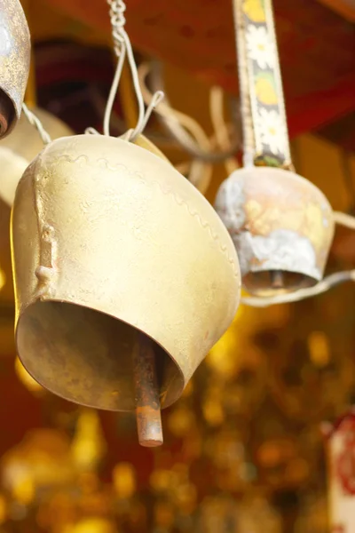 Golden bell on wall vintage — Stock Photo, Image