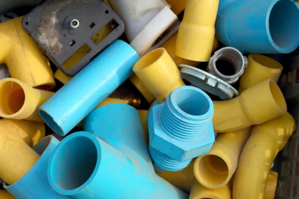 Pvc pipe blue and yellow. — Stock Photo, Image