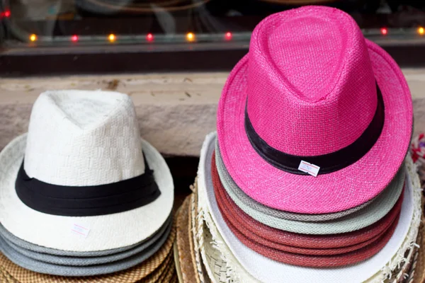 Hats are stacked for sale at the market — Stock Photo, Image