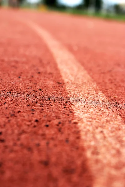 Pista di corsa per lo sfondo degli atleti — Foto Stock