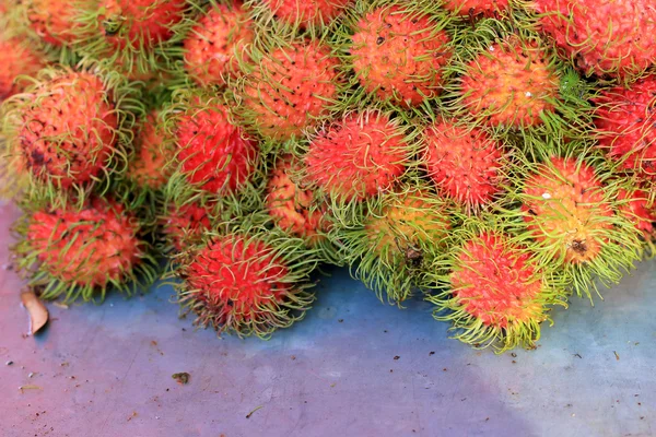 Sweet fruits rambutan in the market — Stock Photo, Image