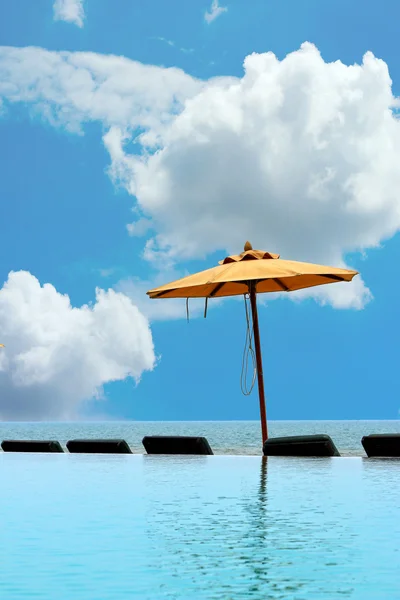 Blue swimming pool near sea in nature — Stock Photo, Image