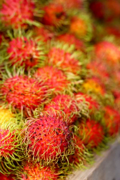 Sweet fruits rambutan in the market — Stock Photo, Image