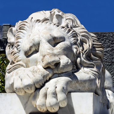 Marble sculpture of sleeping lion