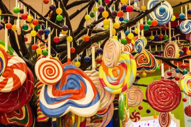 Candies shop. Multicolor sweets on the tree. Candylicious - Candy Store 