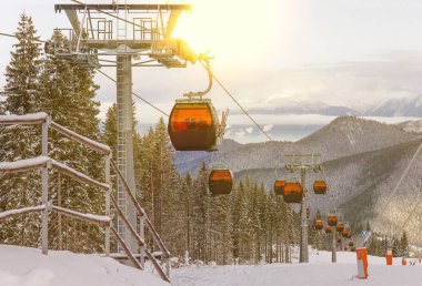 Winter mountain landscape, ski resort funicular view, cable car