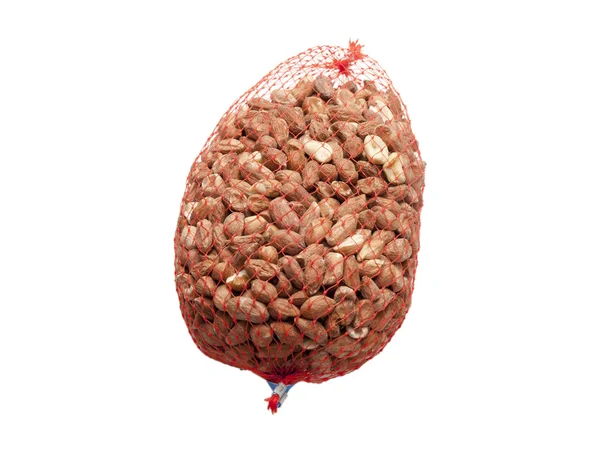 A net including nuts with a white background — Stock Photo, Image