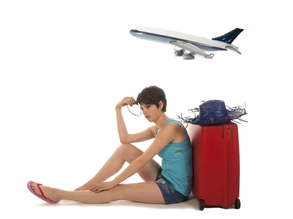 Young woman bored waiting for the departure of a passenger plane — Stock Photo, Image