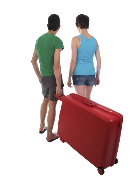 Young couple with suitcase waiting for delayed passenger plane — Stock Photo, Image