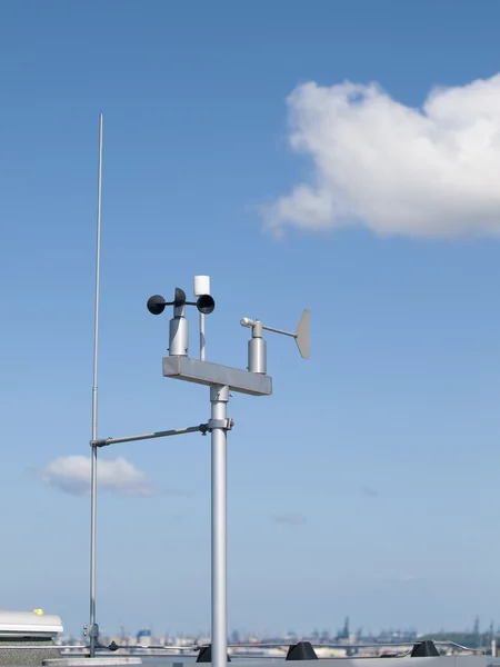 Construction crane and a weather station — Stock Photo, Image