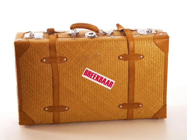 A travel suitcase with a text fragile — Stock Photo, Image