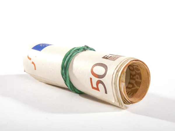 Banknotenrolle mit Gummizug auf weißem Hintergrund — Stockfoto