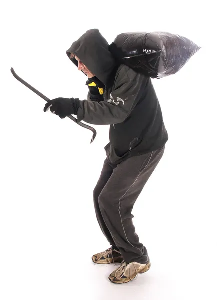 Suspicious burgler with crowbar — Stock Photo, Image