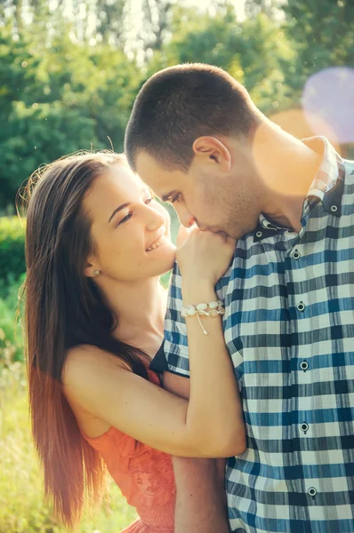 Couple of young lovers hugging Stock Picture