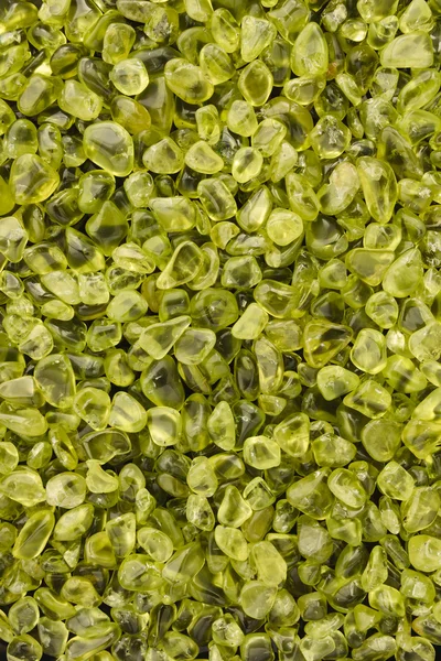 Polished Peridot Background — Stock Photo, Image