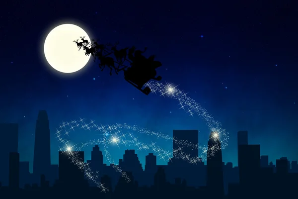 Санта-Клаус едет ночью — стоковое фото