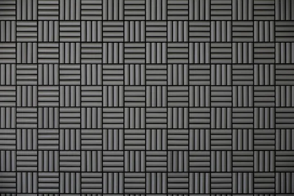 Graue Fliesenwand Mit Geometrischem Muster Als Hintergrundmaterial — Stockfoto