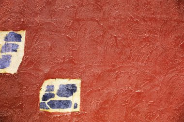 Arkaplan malzemesi için fotoğraf bir terracotta renkli alçı duvarın önünde çekildi