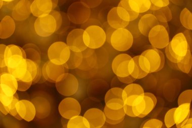 Odaklanmamış altın ışık arkaplan malzeme resmi