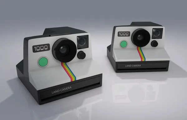 Polaroid kamera na šedém pozadí — Stock fotografie