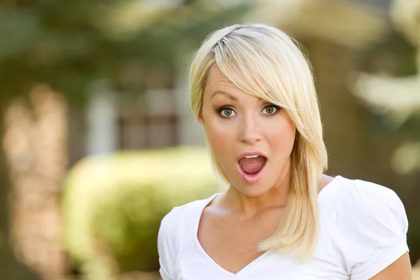 A Surprised Blonde Young Woman — Stock Photo, Image