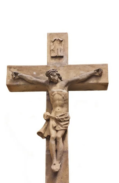 Uma estátua de pedra de Jesus Cristo crucificado isolado em um backgorund branco — Fotografia de Stock