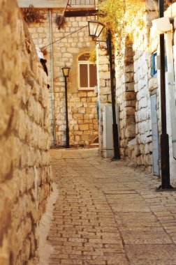 Old and narrow Mediterranean street clipart