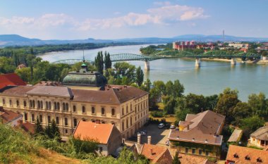 View of an Esztergom in Hungary and Sturovo in Slovakia with Maria Valeria Bridge between. clipart
