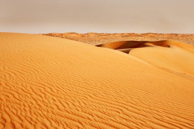 Sandstorm coming over the Arabian desert clipart