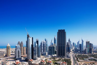 DIFC is the financial hub of Dubai and is graced with beautiful skyscrapers clipart