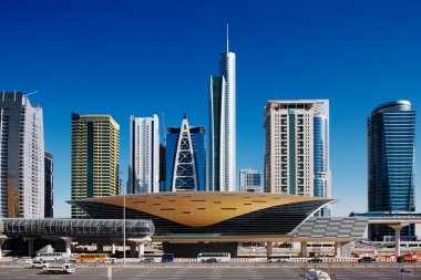 Jumeirah Lakes Towers is a rapidly expanding district of Dubai and is graced by many beautiful architectural towers and a new metro station clipart