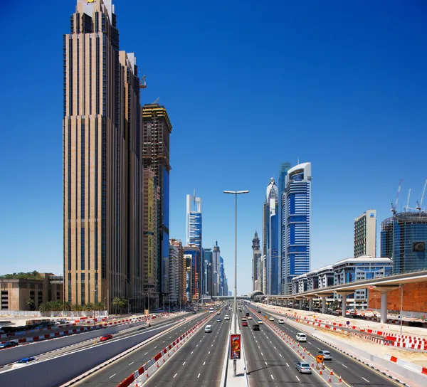 Sheikh Zayed Road is graced with skyscrapers on both sides of the road — Stock Photo, Image